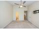 The main bedroom features two closets, neutral walls, ceiling fan, and an ensuite bathroom at 140 Cedar Elm Rd, Durham, NC 27713