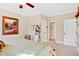 Spacious bedroom with a queen bed, ceiling fan, access to ensuite bath and generous closet space at 149 Country Mill Way, Fuquay Varina, NC 27526