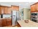 Well-appointed kitchen featuring granite countertops, stainless steel appliances, and custom cabinets at 149 Country Mill Way, Fuquay Varina, NC 27526