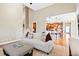 Open living room provides easy access to kitchen and staircase at 149 Country Mill Way, Fuquay Varina, NC 27526
