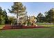 Community playground with slides, climbing structures, picnic area, and benches at 149 Country Mill Way, Fuquay Varina, NC 27526