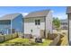 Backyard showcasing home with a privacy fence and patio at 166 Yellow Jacket Rdg, Clayton, NC 27520