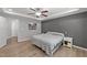 Serene bedroom featuring gray walls, a ceiling fan, and hard wood floors at 166 Yellow Jacket Rdg, Clayton, NC 27520