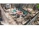 Charming backyard fire pit area surrounded by Adirondack chairs, ideal for relaxing evenings at 166 Yellow Jacket Rdg, Clayton, NC 27520