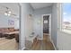 Welcoming foyer with coat rack, bench, and easy access to the living room and other areas at 166 Yellow Jacket Rdg, Clayton, NC 27520