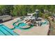 Community water park featuring winding slides, bridges, and a separate pool for leisurely floating at 166 Yellow Jacket Rdg, Clayton, NC 27520