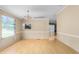 Bright dining room with laminate flooring and views to the exterior at 1729 Crawford Rd, Graham, NC 27253