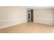 Bright, airy living room with laminate floors and ample natural light at 1729 Crawford Rd, Graham, NC 27253