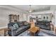 Cozy living room with an open floor plan flows into a modern kitchen and dining area at 1730 Willie Pace Rd, Burlington, NC 27217