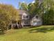 Charming two-story home featuring a well-manicured lawn and attached two car garage at 1850 Crissy Ln, Graham, NC 27253