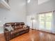 Comfortable living room with hardwood floors and natural light at 1850 Crissy Ln, Graham, NC 27253