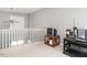 Bright loft area with a ceiling fan, a railing and a nice view of the downstairs at 1850 Crissy Ln, Graham, NC 27253