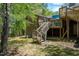 Exterior of the home with a spacious wooden deck at 200 W Woodcroft Pkwy # 45C, Durham, NC 27713