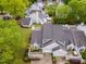 Charming townhouse with well-manicured lawn, small courtyard, and two-car garage nestled in a tranquil, tree-filled neighborhood at 201 Lakewater Dr, Cary, NC 27511