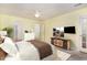 Serene primary bedroom with neutral tones, light-colored carpet, and ample natural light at 201 Lakewater Dr, Cary, NC 27511