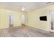 Spacious bedroom featuring a ceiling fan and a door leading to an outdoor space at 201 Lakewater Dr, Cary, NC 27511