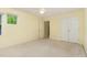 Bedroom with windows and large closet at 201 Lakewater Dr, Cary, NC 27511