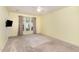 Simple bedroom with a large window with curtains that allows plenty of natural light at 201 Lakewater Dr, Cary, NC 27511