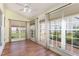 Sunroom with many windows allowing natural light, providing expansive views at 201 Lakewater Dr, Cary, NC 27511