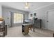 Bedroom with carpet, window, overhead fan and a bunk bed featuring a desk at 204 Oxford Mill Ct, Cary, NC 27518