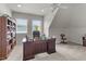 Office featuring carpet floors, natural light and a large desk at 204 Oxford Mill Ct, Cary, NC 27518