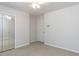Spacious bedroom with a ceiling fan and a mirrored closet door at 222 Kelso Ct, Cary, NC 27511