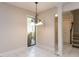 Bright breakfast nook featuring decorative lighting and access to the backyard at 222 Kelso Ct, Cary, NC 27511