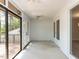 Relaxing screened-in porch features ceiling fans and access to an outdoor deck at 222 Kelso Ct, Cary, NC 27511