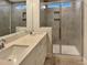 Modern bathroom featuring double vanity with stone countertops and spacious glass enclosed shower at 223 Pond Vw Ct # 10, Fuquay Varina, NC 27526