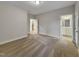 Spacious bedroom with carpeted floors, ensuite bathroom, and natural light at 223 Pond Vw Ct # 10, Fuquay Varina, NC 27526