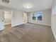 Bedroom featuring neutral carpet, natural light, a walk-in closet and bathroom entrance at 223 Pond Vw Ct # 10, Fuquay Varina, NC 27526