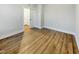 Room with wood-look flooring and white doors leading to other rooms at 223 Pond Vw Ct # 10, Fuquay Varina, NC 27526