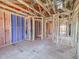 Spacious unfinished room shows the frame of a new home with insulation installed at 223 Pond Vw Ct # 10, Fuquay Varina, NC 27526