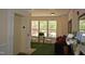 Inviting lobby area with seating, natural light, and elevator access for convenient living at 224 Eyam Hall Ln, Apex, NC 27502
