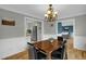 Dining room with hardwood floors adjacent to the kitchen and Gathering room at 2256 W Front St, Burlington, NC 27215