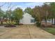 View of a detached garage and long driveway at 2256 W Front St, Burlington, NC 27215