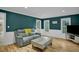 Comfortable living room featuring stylish furniture, hardwood floors, and natural light at 2256 W Front St, Burlington, NC 27215
