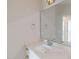 Bathroom featuring a large mirror, modern fixtures, and a sleek vanity at 2313 Bay Minette Sta # 543, Apex, NC 27502