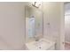 Clean powder room features a white vanity with a sink, modern fixtures, and a large mirror at 2313 Bay Minette Sta # 543, Apex, NC 27502