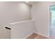 Second floor hallway with stairway at 2313 Bay Minette Sta # 543, Apex, NC 27502