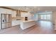 Gourmet kitchen features stainless steel appliances, large island, and easy access to the living area at 2313 Bay Minette Sta # 543, Apex, NC 27502