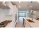 Kitchen features stainless steel appliances, gas cooktop, and center island at 2313 Bay Minette Sta # 543, Apex, NC 27502