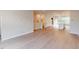 Open-concept living area boasts modern vinyl floors and a kitchen with an island, great for entertaining and Gathering gatherings at 2313 Bay Minette Sta # 543, Apex, NC 27502