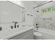This bathroom features a tub shower combo, stylish sink and a decorative mirror at 251 Sequoia Dr, Louisburg, NC 27549