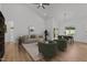 Bright living space featuring modern furnishings, an open layout, and a view to the dining area at 251 Sequoia Dr, Louisburg, NC 27549