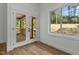 Sun room showcasing windows and a screen door leading to a deck at 251 Sequoia Dr, Louisburg, NC 27549