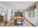 Formal dining room featuring stylish decor, lots of natural light, and direct view to the kitchen at 2805 Chelsea Cir, Durham, NC 27707