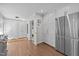 Gourmet kitchen featuring stainless steel appliances, white cabinetry and hardwood flooring at 2805 Chelsea Cir, Durham, NC 27707