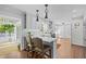 Beautiful updated kitchen with white cabinets, stainless steel appliances, and stylish bar seating at 2805 Chelsea Cir, Durham, NC 27707