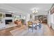 Open-concept living and dining area with a fireplace, a dining table and a view to the Kitchen at 2805 Chelsea Cir, Durham, NC 27707